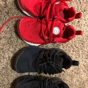 2 pairs of Nike kids shoes